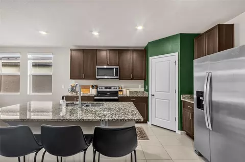 Kitchen - 7017 Feather River Pl, Parrish, FL 34219 photo 3 of 4