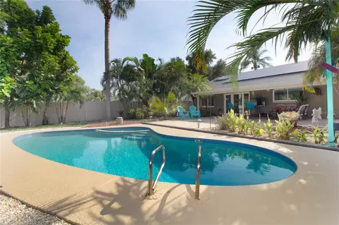 Exterior - 1613 St Catherine Dr E, Dunedin, FL 34698 photo 6 of 8