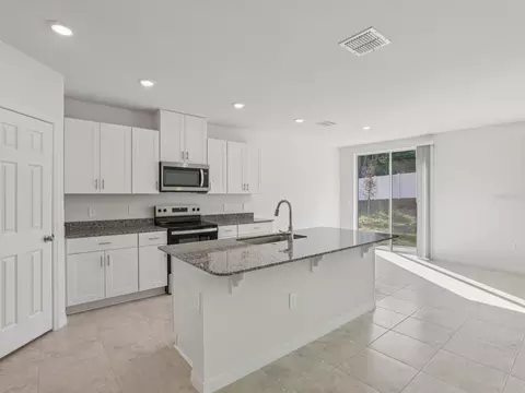 Kitchen - 2896 Wild Olive Dr, Saint Cloud, FL 34772 photo 2 of 3