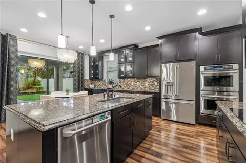 Kitchen - 1657 Feather Grass Loop, Lutz, FL 33558 photo 1 of 8