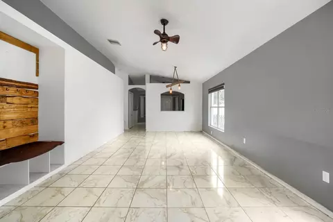Living - 701 Periwinkle Pointe Pl, Seffner, FL 33584 photo 7 of 8