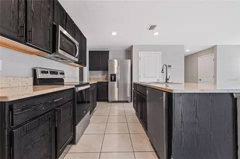 Kitchen - 11722 White Willow Ln, Riverview, FL 33569 photo 2 of 3