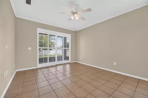 Living - 24519 Breezy Oak Ct, Lutz, FL 33559 photo 9 of 11