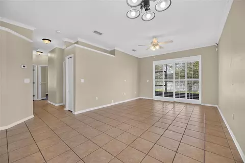 Living - 24519 Breezy Oak Ct, Lutz, FL 33559 photo 8 of 11