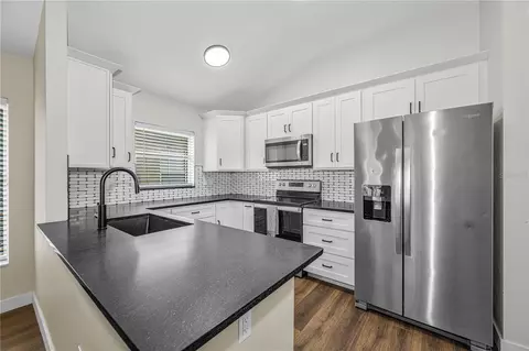 Kitchen - 5229 Mango Fruit St, Seffner, FL 33584 photo 1 of 7