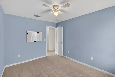 Bedroom - 8435 Hunters Fork Loop, Ruskin, FL 33573 photo 11 of 14