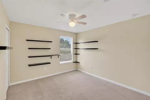 Bedroom - 8435 Hunters Fork Loop, Ruskin, FL 33573 photo 12 of 14