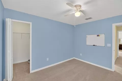 Bedroom - 8435 Hunters Fork Loop, Ruskin, FL 33573 photo 9 of 14