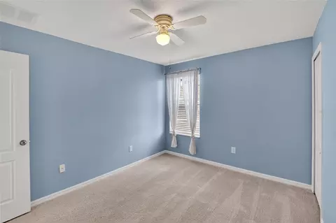 Bedroom - 8435 Hunters Fork Loop, Ruskin, FL 33573 photo 10 of 14