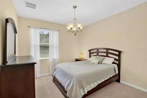 Bedroom - 8435 Hunters Fork Loop, Ruskin, FL 33573 photo 1 of 14