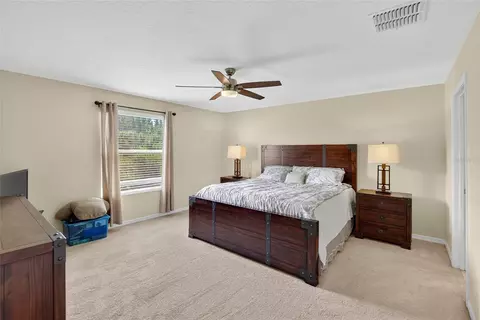 Bedroom - 8435 Hunters Fork Loop, Ruskin, FL 33573 photo 4 of 14