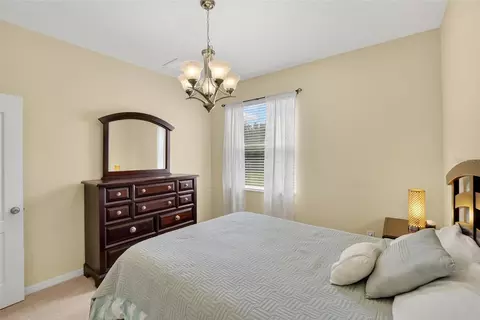 Bedroom - 8435 Hunters Fork Loop, Ruskin, FL 33573 photo 2 of 14
