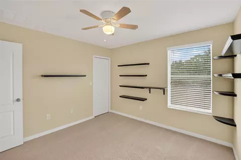 Bedroom - 8435 Hunters Fork Loop, Ruskin, FL 33573 photo 13 of 14