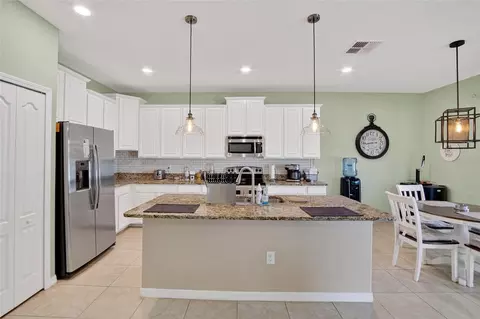 Kitchen - 8435 Hunters Fork Loop, Ruskin, FL 33573 photo 1 of 5