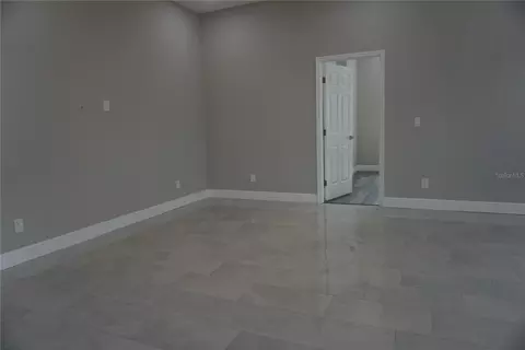 Living - 12572 Tree St, Largo, FL 33773 photo 2 of 4