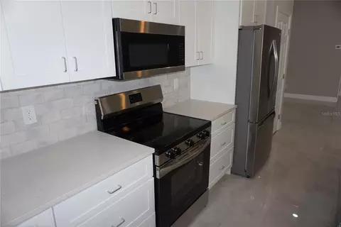 Kitchen - 12572 Tree St, Largo, FL 33773 photo 3 of 3