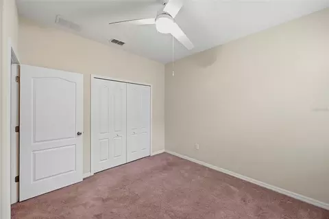 Bedroom - 5009 Jagged Cloud Dr, Wimauma, FL 33598 photo 13 of 17