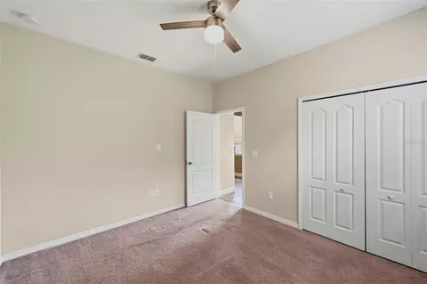Bedroom - 5009 Jagged Cloud Dr, Wimauma, FL 33598 photo 4 of 17