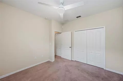 Bedroom - 5009 Jagged Cloud Dr, Wimauma, FL 33598 photo 12 of 17