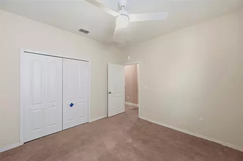 Bedroom - 5009 Jagged Cloud Dr, Wimauma, FL 33598 photo 8 of 17