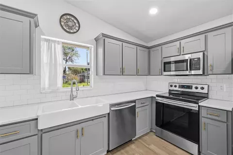 Kitchen - 213 E Cluster Ave, Tampa, FL 33604 photo 2 of 3