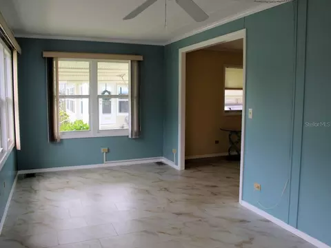 Living - 92 Thatch Palm St E, Largo, FL 33770 photo 2 of 2