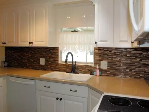Kitchen - 92 Thatch Palm St E, Largo, FL 33770 photo 2 of 2