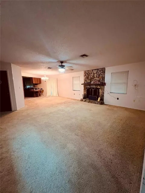 Living - 12412 116th St, Largo, FL 33778 photo 2 of 2