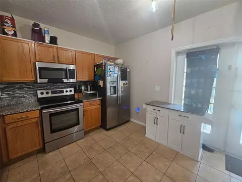 Kitchen - 11731 Mango Cross Ct, Seffner, FL 33584 photo 3 of 3