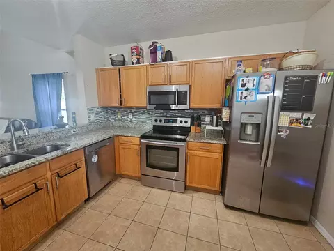 Kitchen - 11731 Mango Cross Ct, Seffner, FL 33584 photo 2 of 3
