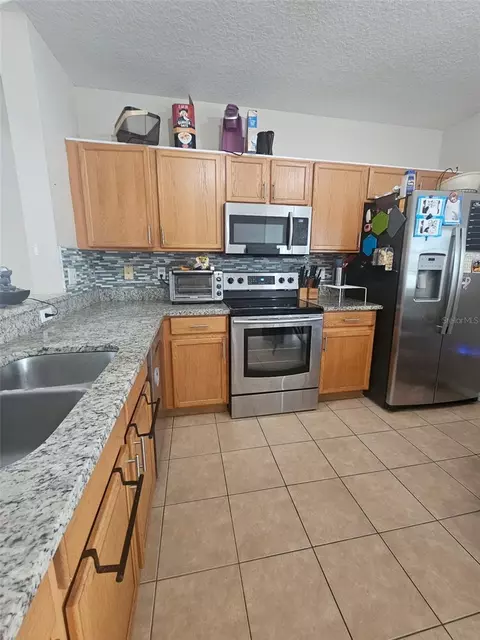 Kitchen - 11731 Mango Cross Ct, Seffner, FL 33584 photo 1 of 3