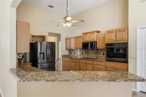 Kitchen - 926 E Triple Crown Loop, Hernando, FL 34442 photo 2 of 5