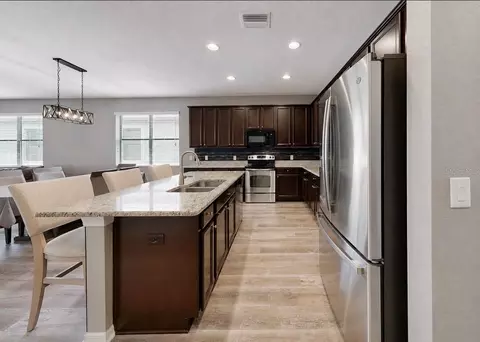 Kitchen - 11510 Scarlet Ibis Pl, Riverview, FL 33569 photo 3 of 5
