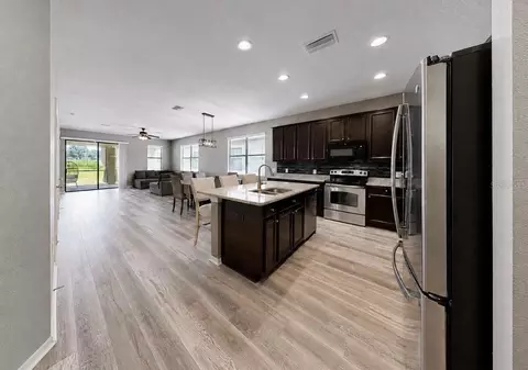 Kitchen - 11510 Scarlet Ibis Pl, Riverview, FL 33569 photo 2 of 5