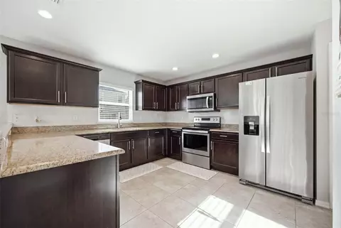 Kitchen - 9649 Tocobaga Pl, Riverview, FL 33578 photo 2 of 4