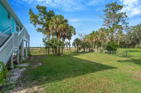 Exterior - 4035 Eagle Nest Dr, Hernando Beach, FL 34607 photo 5 of 10