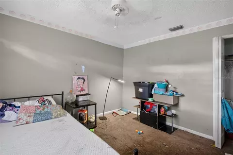 Bedroom - 13277 Brewster Rd, Spring Hill, FL 34609 photo 12 of 14