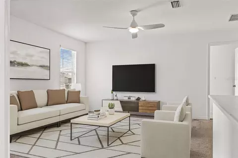 Living - 7328 Pool Compass Loop, Wesley Chapel, FL 33545 photo 3 of 3