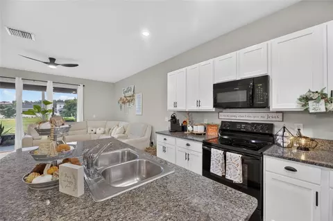 Kitchen - 8669 Falling Blue Pl, Riverview, FL 33578 photo 3 of 5