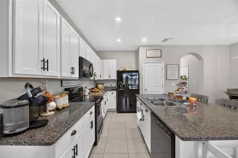 Kitchen - 8669 Falling Blue Pl, Riverview, FL 33578 photo 2 of 5