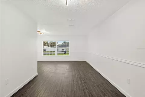 Living - 4220 Augustine Rd, Spring Hill, FL 34609 photo 5 of 9