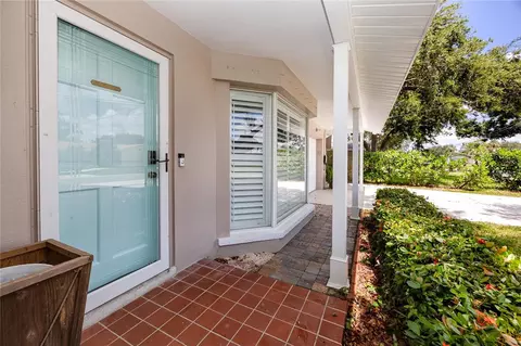 Exterior - 1744 Harbor Cir E, Largo, FL 33770 photo 5 of 9
