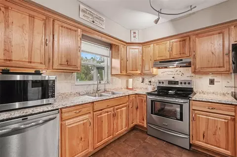 Kitchen - 8318 Goodrich St, Spring Hill, FL 34606 photo 2 of 2
