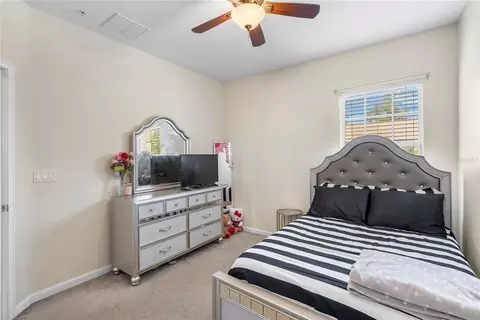 Bedroom - 1936 Compass Flower Way, Ocoee, FL 34761 photo 3 of 8