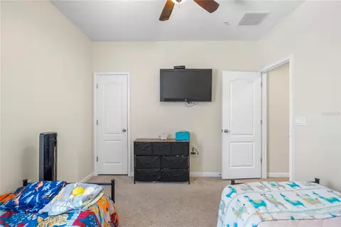 Bedroom - 1936 Compass Flower Way, Ocoee, FL 34761 photo 5 of 8