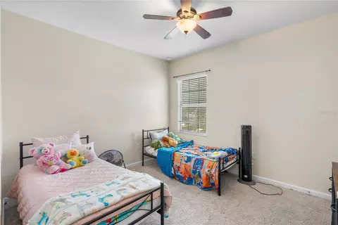 Bedroom - 1936 Compass Flower Way, Ocoee, FL 34761 photo 4 of 8