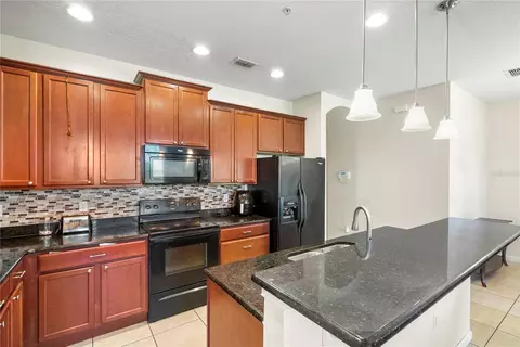 Kitchen - 1936 Compass Flower Way, Ocoee, FL 34761 photo 2 of 5