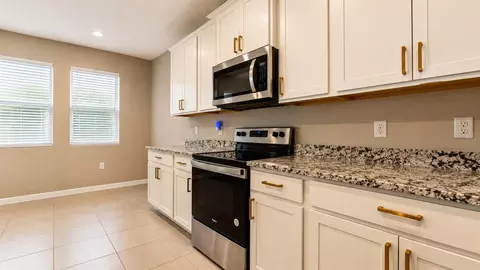 Kitchen - 12455 Shining Willow St, Riverview, FL 33579 photo 2 of 5