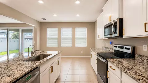Kitchen - 12455 Shining Willow St, Riverview, FL 33579 photo 5 of 5