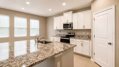 Kitchen - 12455 Shining Willow St, Riverview, FL 33579 photo 3 of 5